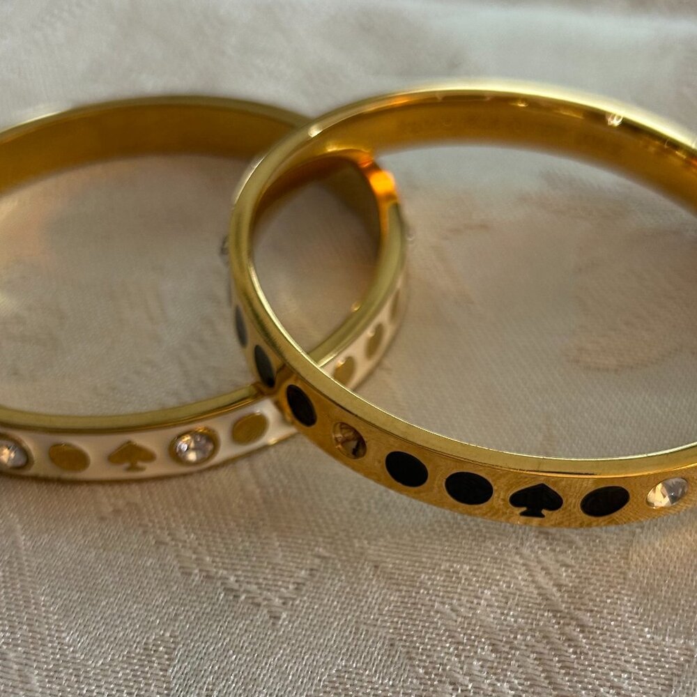 Kate Spade Gold/Enameled Bangle Bracelets (2) white/gold and Black/Gold
